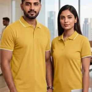 Professional Indian male and female models wearing black polo t-shirts in a modern office setting